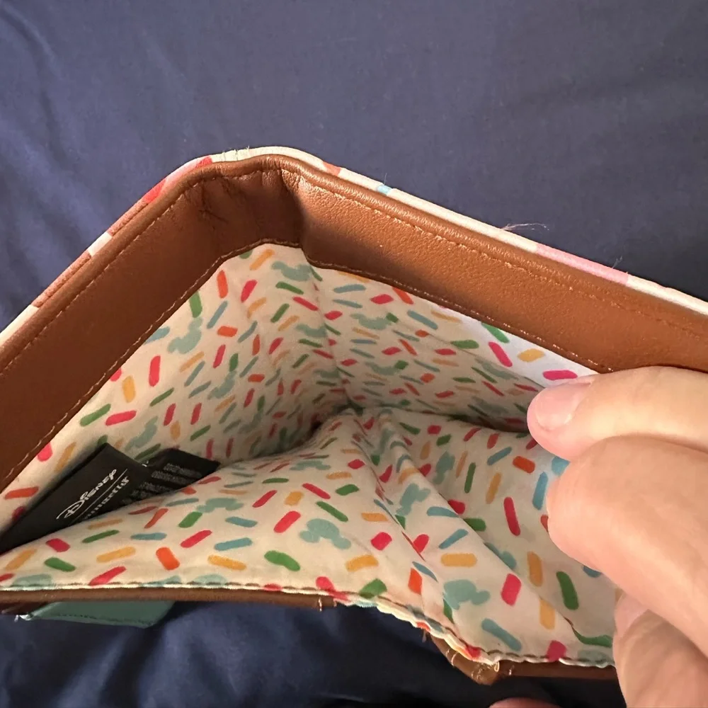 Lounge fly Mickey wallet 
Used
Please see pictures for wear and tear - Picture 4 of 5